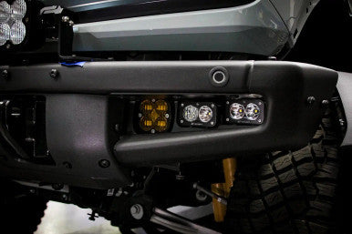 Installed Close Up Baja Designs Ford Squadron SAE/Dual S2 Sport Steel Bumper Fog Pocket Light Kit - 2021-23 Bronco