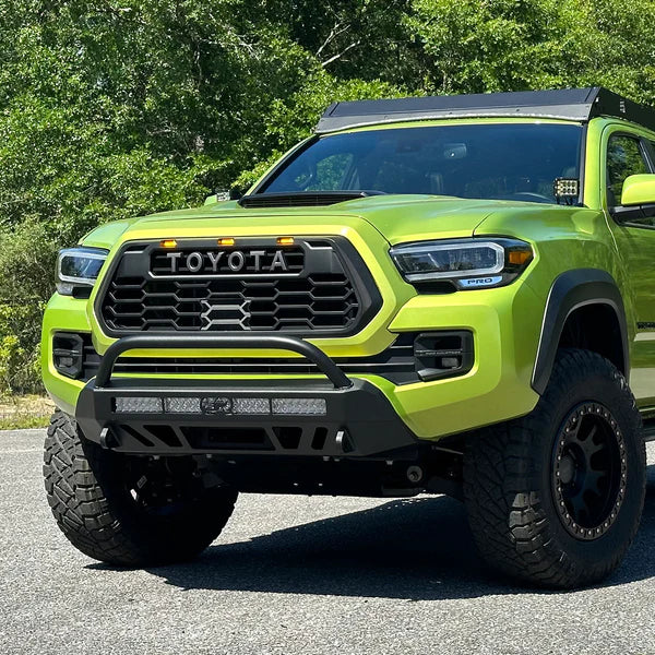 The Car on Road with CALI RAISED TOYOTA STEALTH BUMPER | 2016-2023 TACOMA (Secondary 32in COMBO BEAM with Relocation Mounts)