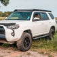 The Car On A Grassy Area with Installed Cali Raised Premium Roof Rack | 2010-2023 Toyota 4Runner