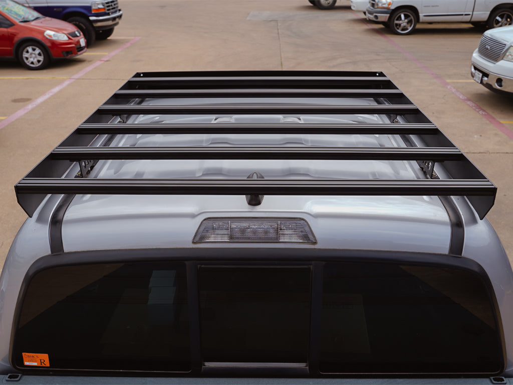 Installed of Car look from behind Cali Raised Toyota Economy Roof Rack | 2005-2023 Tacoma