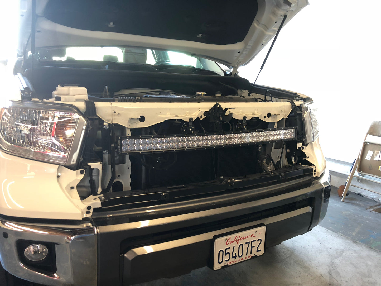 Installed Light Bar on Car Cali Raised 42" Hidden Grille Curved LED Light Bar Brackets Kit | 2014-2021 Toyota Tundra