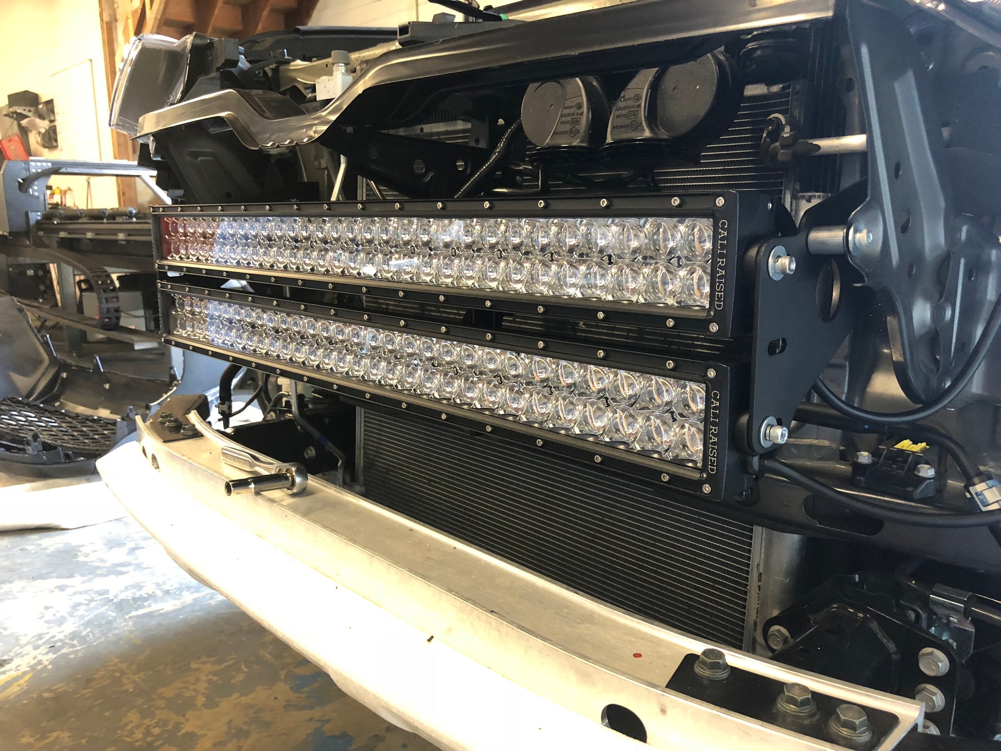 Installed on Car Cali Raised 32" Hidden Grille LED Light Bar Brackets Kit | 2014-2023 Toyota 4Runner